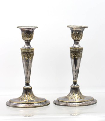 Auktion 363<br>Leuchterpaar um 1900, WMF Straussenmarke, Messing versilbert, 1x leicht verbogen, ca. H-20cm [1]