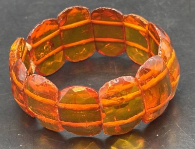 Auktion 363<br>Bernstein-Zugarmband, H-3 cm, 17,1 gr. [1]