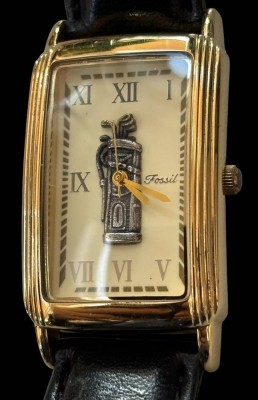 Auktion 364<br>Fossil Quartz HAU mit Golftasche, Mod. SE-1008, Werk läuft, Ziffernblatt ca, 3x2,5 cm, guter Zustand, Lederband [1]