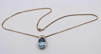 Auktion 364<br>925er Anhänger an Kette, vergoldet, hellblauer Stein, ca. L-48cm, Anh. ca. L-2,3cm, 12,3gr. [1]