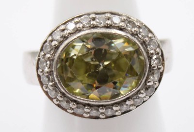 Auktion 364<br>925er Silber-Ring, hellgelber Stein sowie klare Steine, Stein etwas lose, 10,4gr., RG 59 [1]