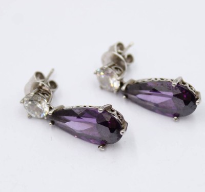 Auktion 364<br>925er Ohrstecker, klarer u. lila Stein, zus. 6,9gr., ca. L-2,5cm [1]