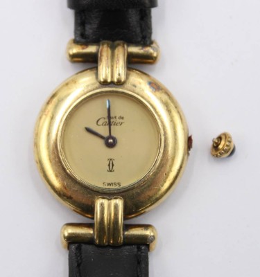 Auktion 364<br>Damenarmbanduhr, Must de Cartier, Quarzwerk nicht geprüft, 925er Silber vergoldet, Krone lose anbei, ca. D-2,4cm [1]