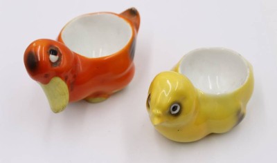 Auktion 364<br>2x figürl. Eierbecher, älter, Ente und Küken (Schnabel bestossen), ca. H-6cm L-9cm [1]