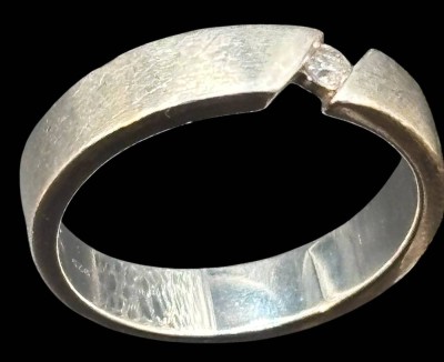 Auktion 364<br>Silber-925- Spannring mit klaren Stein, RG 64, 5,8 g4r. [1]