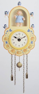 Auktion 365<br>Wanduhr gelb mit Mädchen und Vogel, Wendt & Kühn, Erzgebirge, in orig. Karton, ca. H-14cm [1]