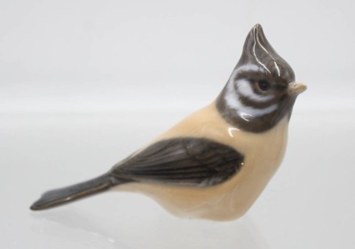 Auktion 365<br>Haubenmeise, Royal Copenhagen, Entw. Peter Herold, Modellnr. 1506, Unterglasurfarben, ca. H-6,2cm L-10cm [1]