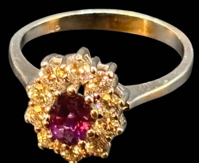 Auktion 365<br>Silberring-925- mit lila Centerstein, umringt von klaren Steinen, RG 54, 2,9 gr [1]