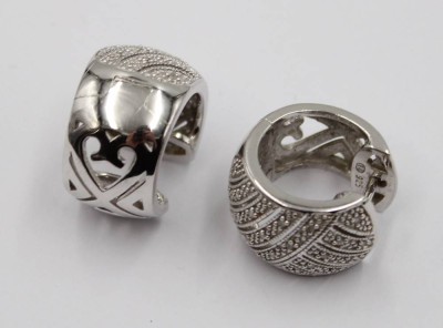 Auktion 365<br>Ohrringe mit Diamanten, [1]