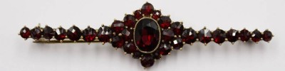 Auktion 365<br>Brosche mit Granat aus Normgold gestempelt NORM,  [1]