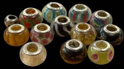 Auktion 365<br>13 Charms, alle Silber-925-, zus. ca. 30 gr., Tragespuren [1]