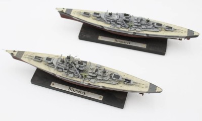 Auktion 366<br>2x kl. Schiffmodelle der Bismarck, Metall, 1x beschädigt, ca. L-19cm [1]