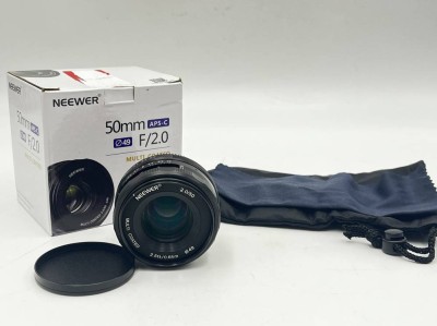 Auktion 366<br>NEEWER Objektiv, 50mm/ F-2.0, Multi Coated, mit Tasche & Putztuch, in orig. Karton,  [1]