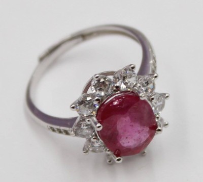 Auktion 366<br>925er Silber-Ring mit erhitztem Rubin und klaren Steinen, 2,6gr., offene Schiene [1]