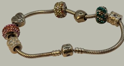 Auktion 366<br>orig. Pandora Armband mit 7 versch. Charms, 33,5 gr. [1]