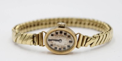 Auktion 367<br>kl. Damen-Armbanduhr, 585er GG Gehäuse, Flexarmband, Werk steht, ca. 1,7 x 1,4cm [1]