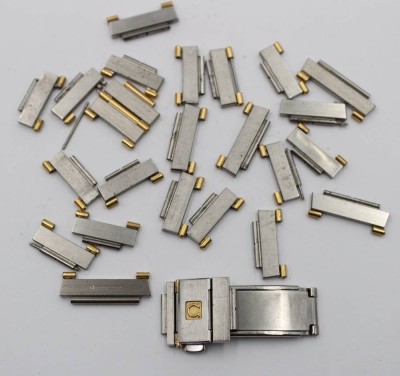 Auktion 368<br>Omega Uhrenarmband, Stahl/Gold, zerlegt [1]