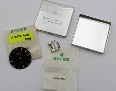 Auktion 368<br>Rolex Precision 6426 Ziffernblatt, Zeiger, plus Ersatz-Glied, in orig. Rolex Dose [1]