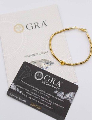 Auktion 368<br>vergoldetes Armband, mit einem 1 ct Moissanite, anbei GRA Zertifikat [1]