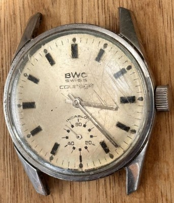 Auktion 369<br>BWC Swiss Courage mechan. Armbanduhr, ohne Band, Glas zerkratzt, Tragespuren, Werk läuft [1]