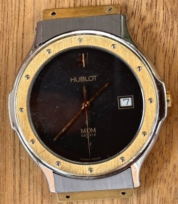 Auktion 369<br>Damen-/Unisex-Uhr-HUBLOT MDM Genève Quarz - 33 mm , Stahl/Gold, frühe Ausgabe dieser Luxusuhr, wohl 80-er Jahre, ohne Band, Werk nicht geprüft [1]