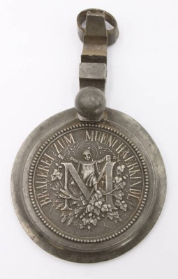 Auktion 369<br>Zinndeckel, Brauerei zum Münchner Kindl, älter, ca. D-9cm [1]