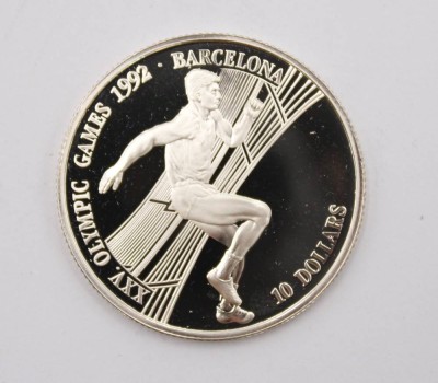 Auktion 369<br>Silbermünze der Cookinseln, 10 Dollar XXV. Olympische Spiele 1992 in Barcelona, 925er Silber, 10 gr., ca. D-3cm [1]