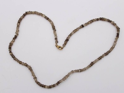 Auktion 369<br>Rauchquarz-Halskette, 333er GG Schließe, ca. L-45cm [1]