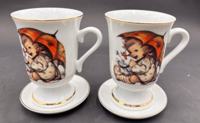 Auktion 369<br>2x Teller und 2   Kakao-Tassen H-12 cm, mit U.T. Streuerpaar, H-6 cm 