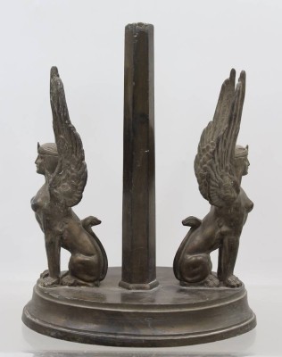 Auktion 369<br>Empire-Stand wohl für Tafelaufsatz,  beidseitig Sphinx, wohl Zinn ?, H-24cm B-19cm T-13cm [1]