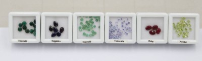 Auktion 369<br>ca. 100 Steine, Rubine, Peridots, Smaragde, Saphire, Tansanite [1]