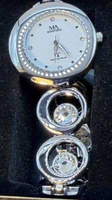 Auktion 370<br>Funk Quarz Damen Lady Line, wohl ungetragen, Stahlband mit 4 grossen, klaren Steinen, Rückseite mit orig. Schutzfolie [1]