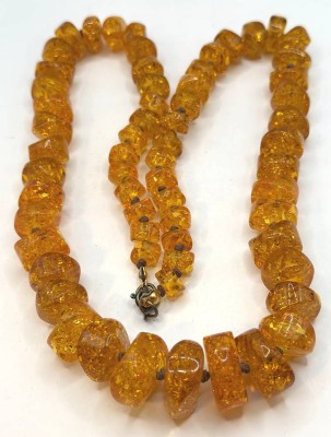 Auktion 370<br>Bernstein? Halskette, verlaufend, ca. 60 cm, 67 gr. [1]