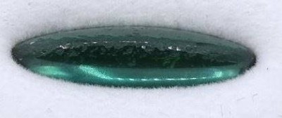 Auktion 370<br>Turmalin 5,31 ct, navetteförmiger Cabochon, 21 x 3,5 mm, l. best. [1]