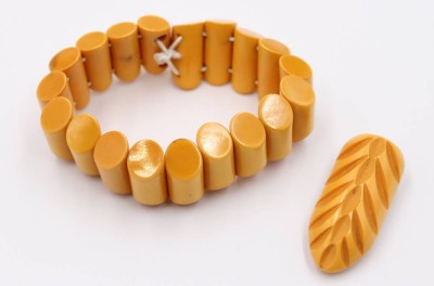 Auktion 370<br>2 Teile Bakelitschmuck, älter, Armband und Brosche, B-2,2cm Brosche L-4,2cm [1]