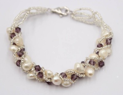 Auktion 370<br>Armband, SW-Perlen und wohl Amethyst?, Silberschließe, ca. L-19cm [1]