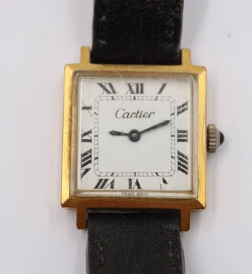 Auktion 372<br>Vintage-Damen-Armbanduhr CARTIER, Tank, 18 K Gold plated, Handaufzug, Werk läuft, Tragespuren, ca. 2,2 x 2,2cm [1]