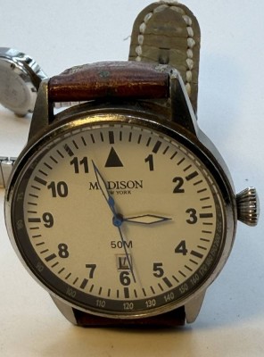 Auktion 372<br>gr. Quartz Armbanduhr 