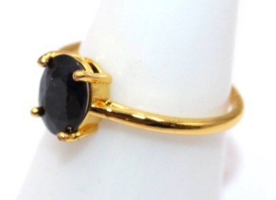 Auktion 372<br>Modeschmuckring wohl mit Onyx, goldfarben, RG 58 [1]