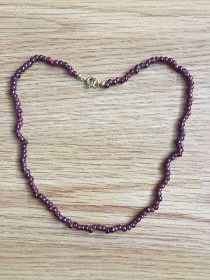 Auktion 372<br>Granat Kette mit Federring aus 333 Gold . Länge: ca. 37 cm. [1]