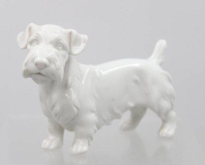 Auktion 373<br>Terrier,  Augarten Wien, Weißporzellan, Entw. Möller, ca. H-9cm L-13,5cm [1]