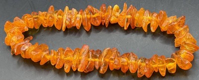 Auktion 373<br>Bernstein-Armkette, Gummizug, L-ca. 18 cm, ca. 10 gr [1]
